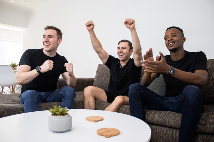 Men Enthusiastically Watching Sports