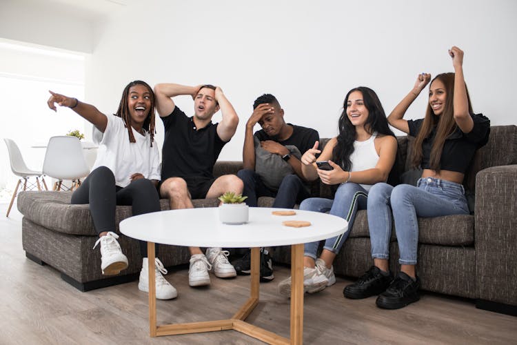 Group Of Friends Watching Sports Together