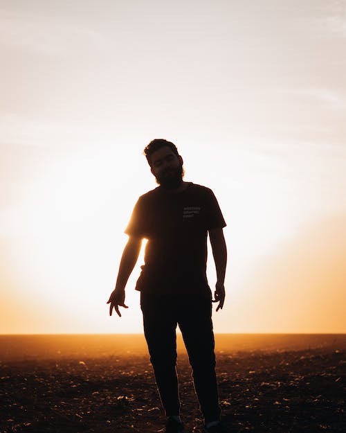 Silhouette of a Man During Sunset