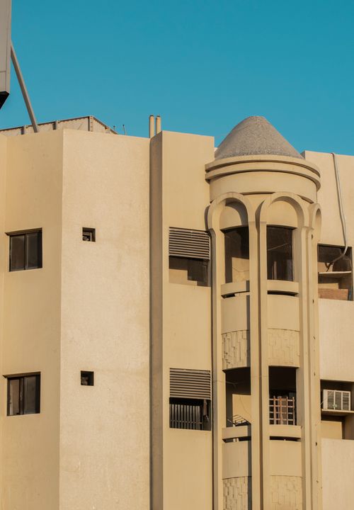 Free Explore this modern building facade in Dubai featuring unique Ottoman architectural elements. Stock Photo