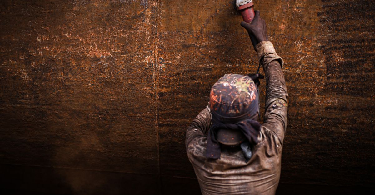 Rust Grinding Person Grinding a Rust Metal · Free Stock Photo