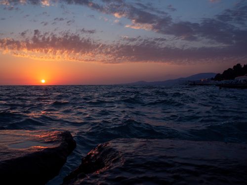 Free Beautiful sunset over the Black Sea in Sochi, Russia, capturing vivid colors and serene waves. Stock Photo