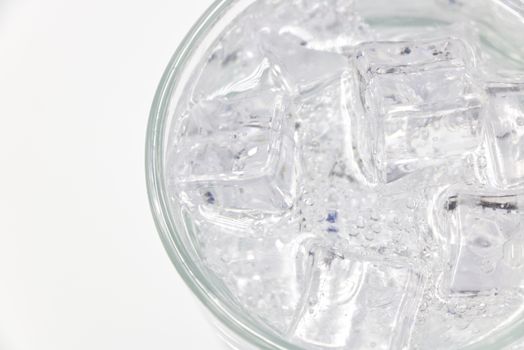 Bubbles rising in a glass of sparkling water