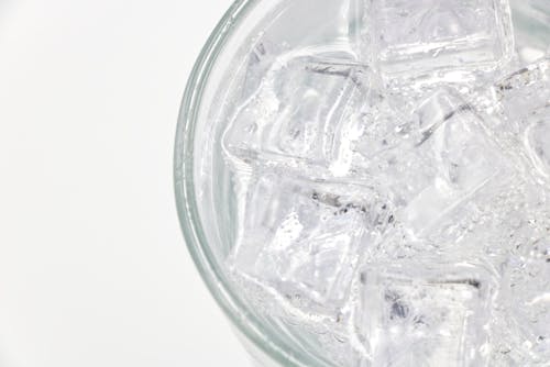 A Glass of Sparkling Soda Water with Ice Cubes 