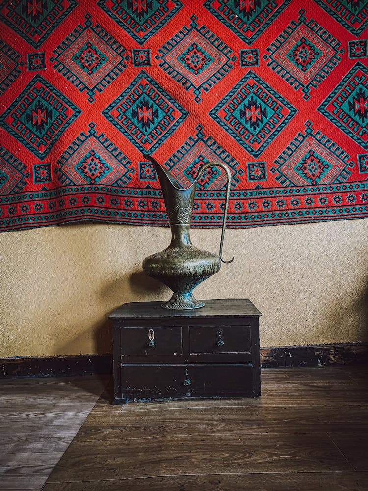 Antique Brass Jar On A Table