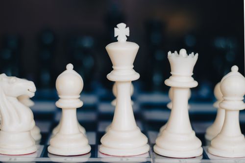 Free Close-up photo of aligned and focused chess pieces, showcasing strategic planning. Stock Photo