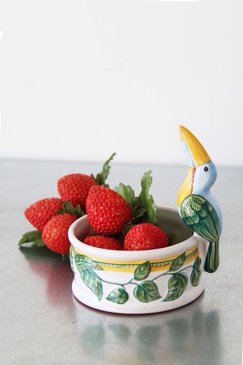 Delicious Red Strawberries in a Ceramic Bowl