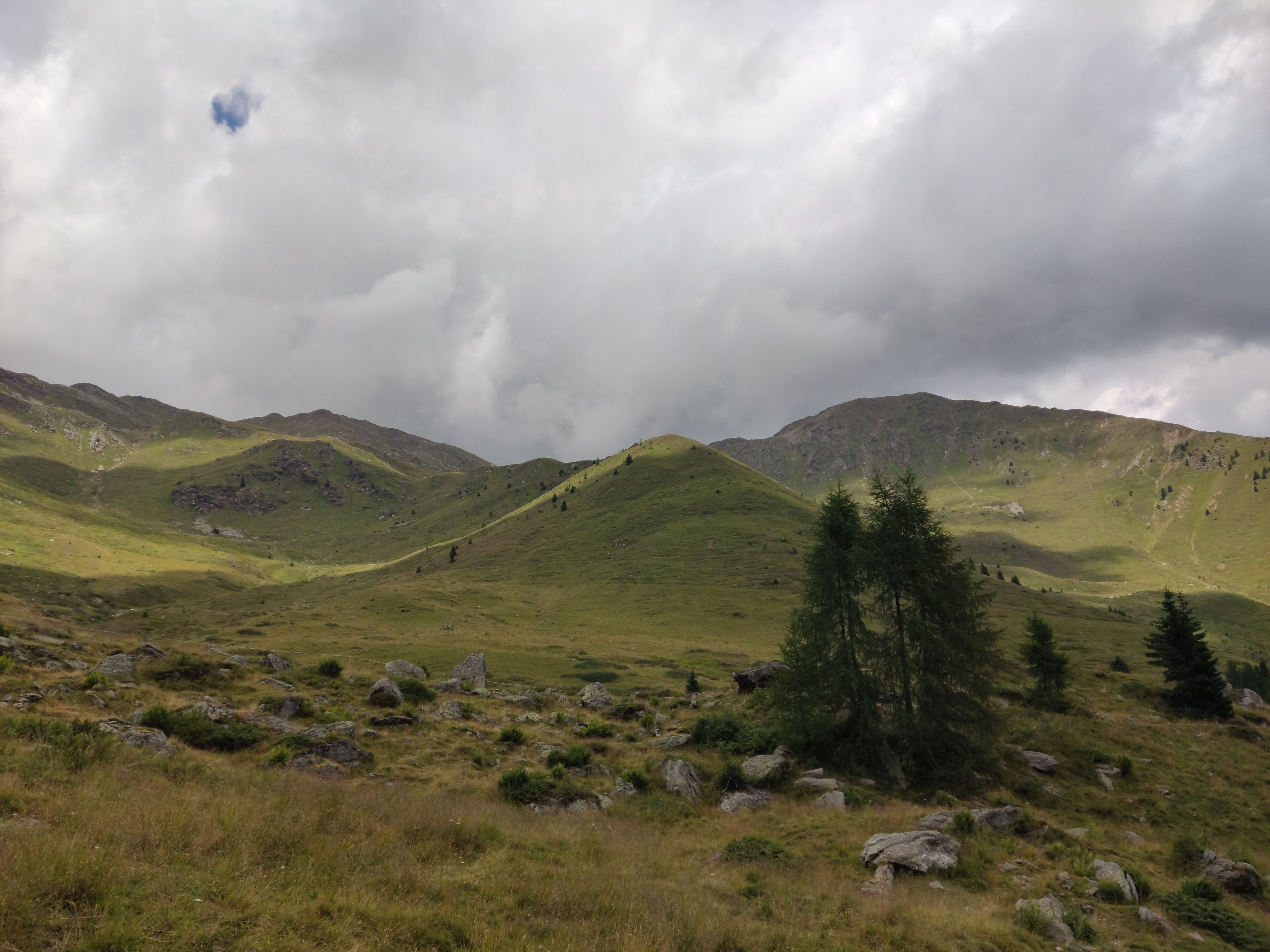 Green Hills under the Cloudy Sky · Free Stock Photo