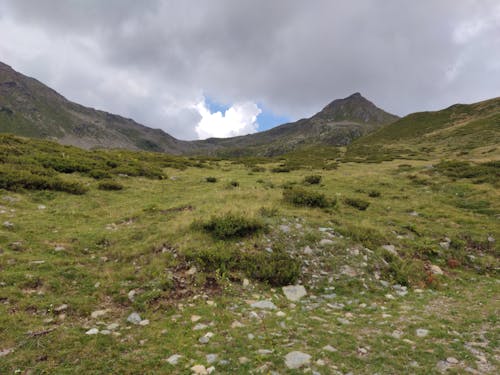 Green Mountains Under the Cloudy Sky 