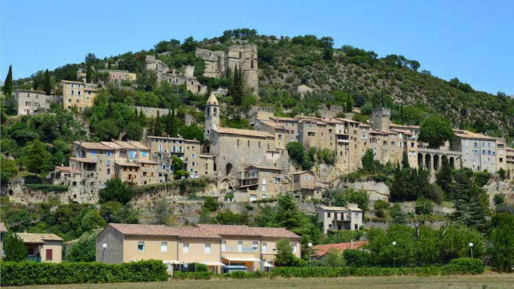 Stone Castle On Hill In Mountains Landscape