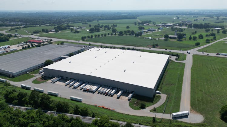 An Aerial Shot Of A Warehouse With A Loading Dock