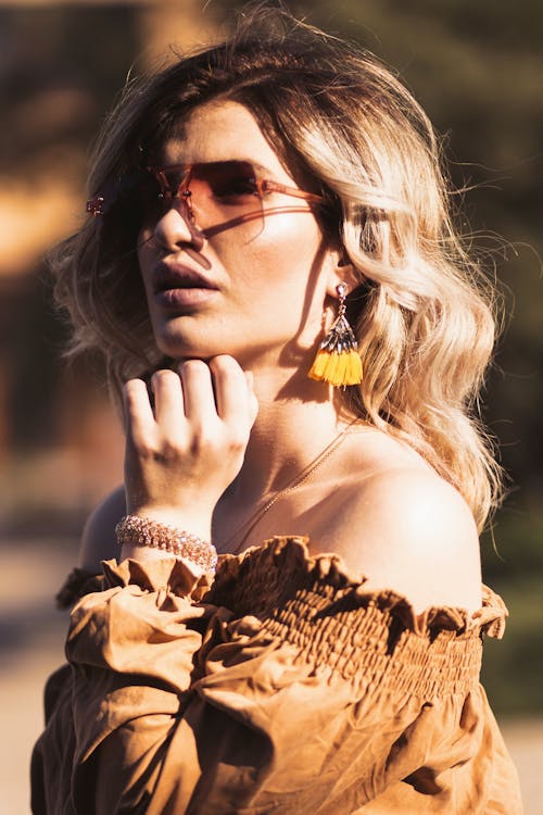 Selective Focus Photography of Woman Taking Selfie