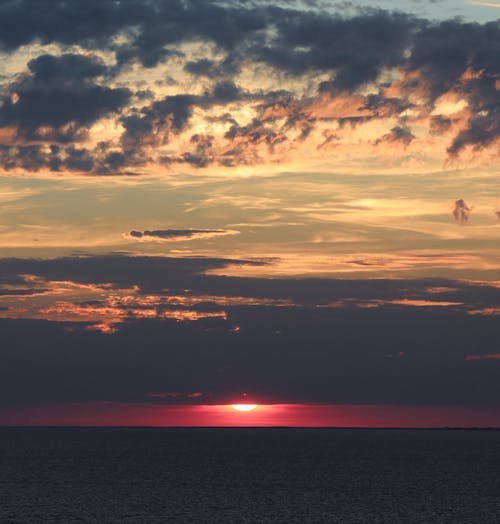 Fotos de stock gratuitas de cielo nublado, hora dorada, mar