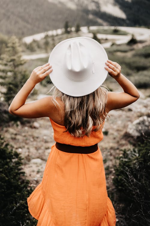 Free Woman in White Hat on Trail Stock Photo