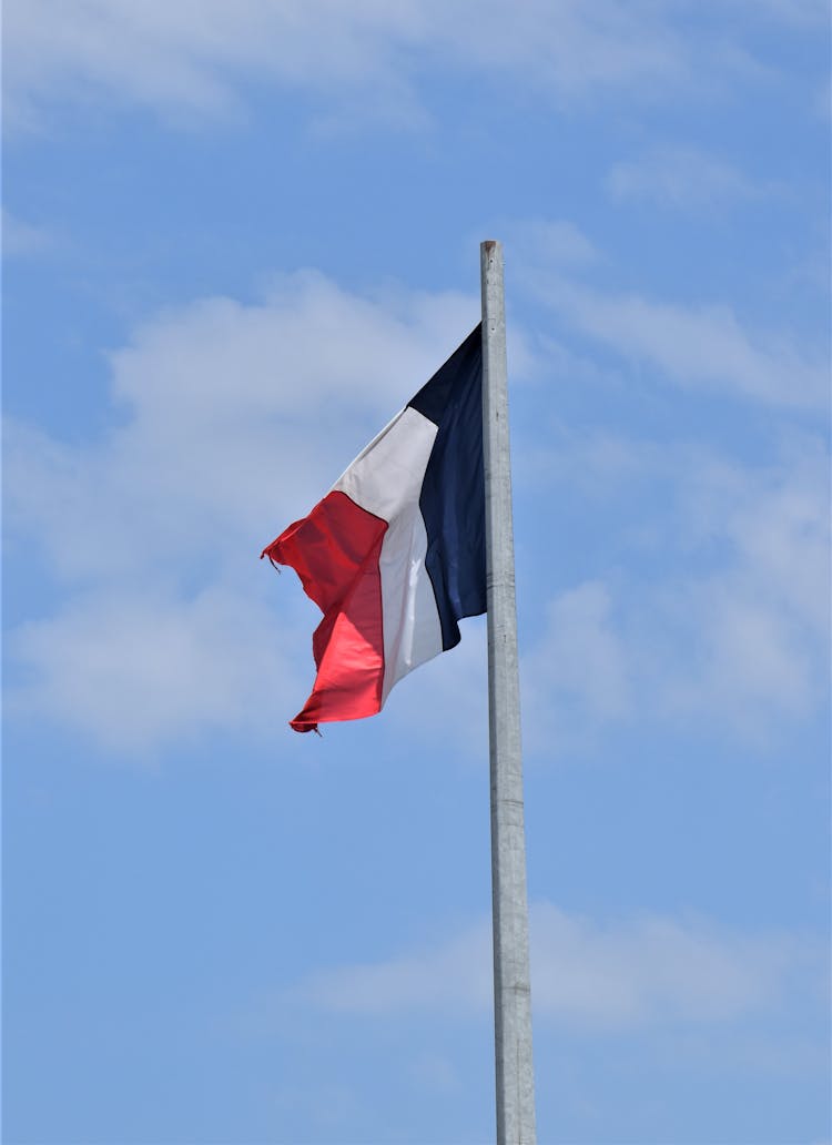 The Flag Of France On A Flagpole