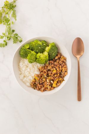 Broccoli and spiced lentil bowl — photo by Daniela Crucez on Pexels