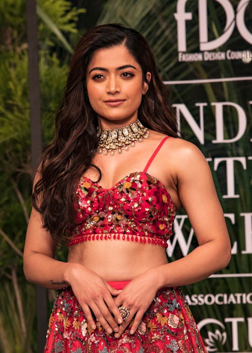 Woman in Red Sparkly Bra and Choker