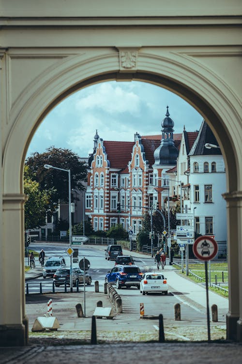 Cars Parked on Street Near Building