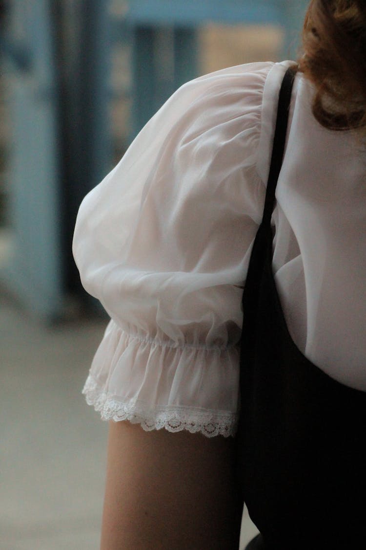 Woman In White Long Sleeve Shirt