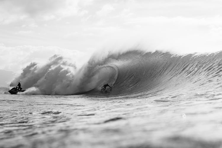 Surfers On Wave