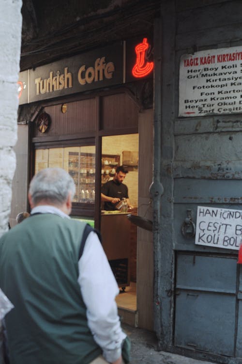 A Man Going to a Coffeehouse