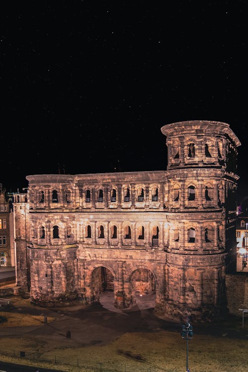 Brown Concrete Building during Night Time