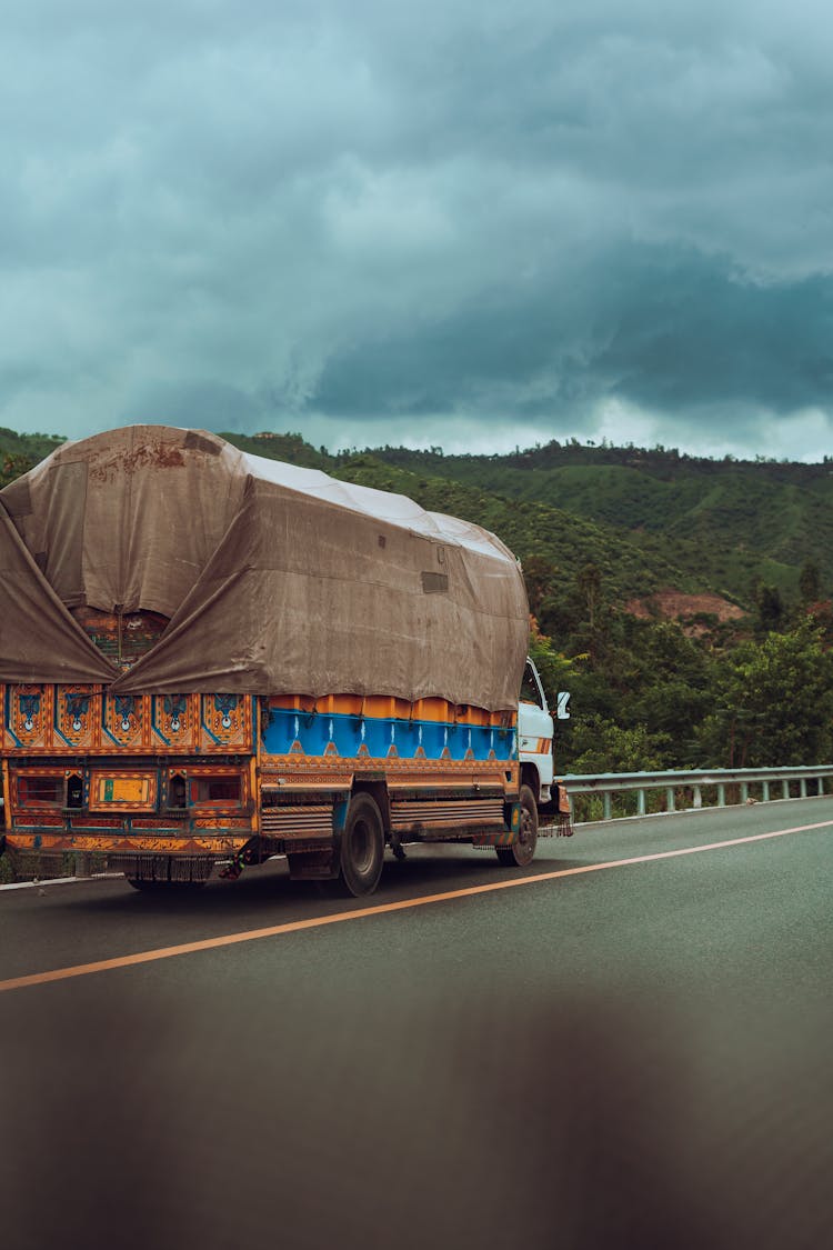 A Truck Travelling On A Road