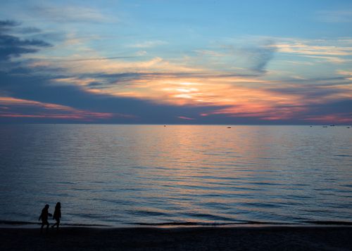 Free Idyllic sunset view with silhouettes on the beach at Port Elgin, Canada. Stock Photo