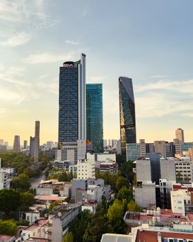 A stunning view of Mexico City's modern skyscrapers during the day, capturing urban architecture.