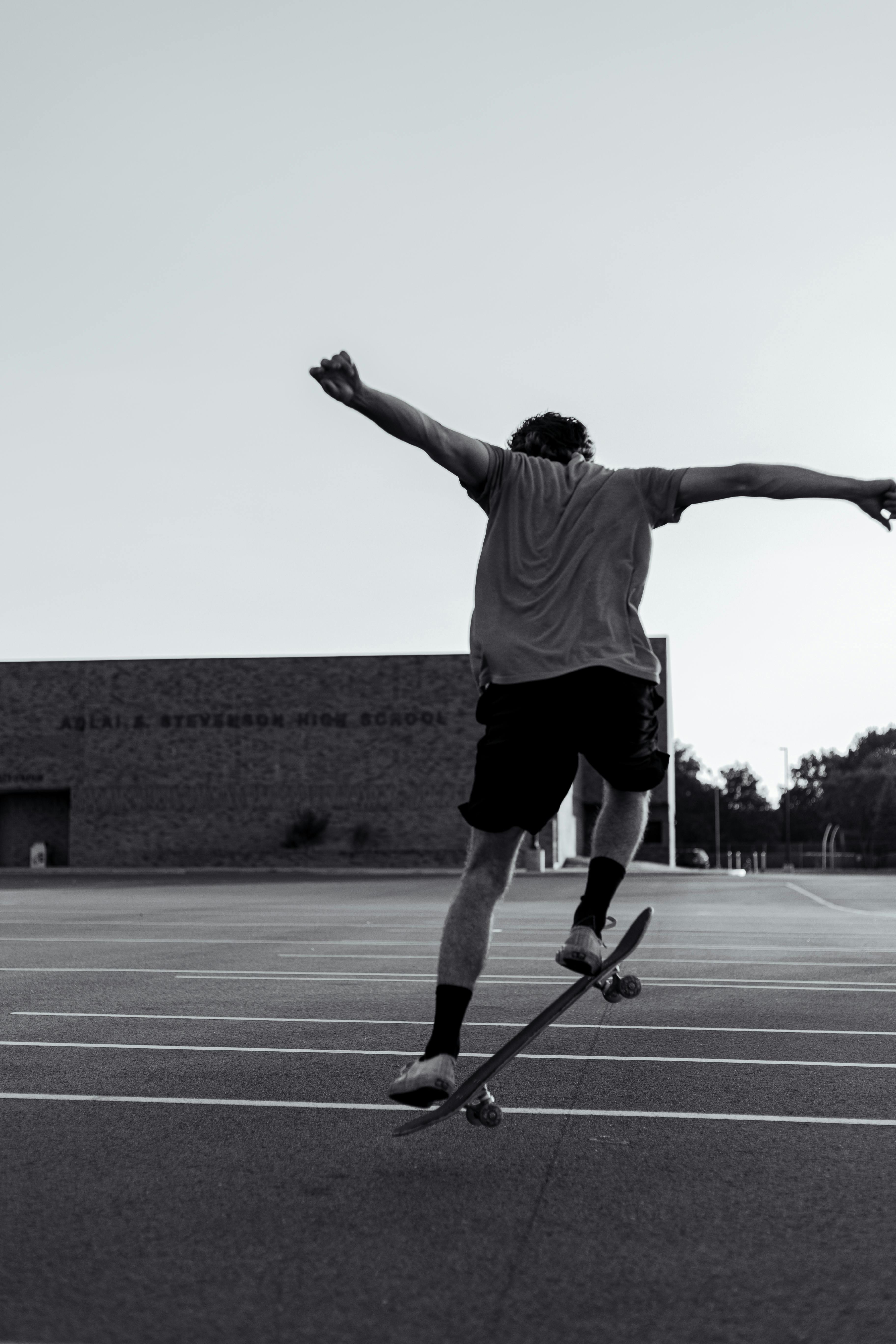 Skateboarding Man in Black and White · Free Stock Photo