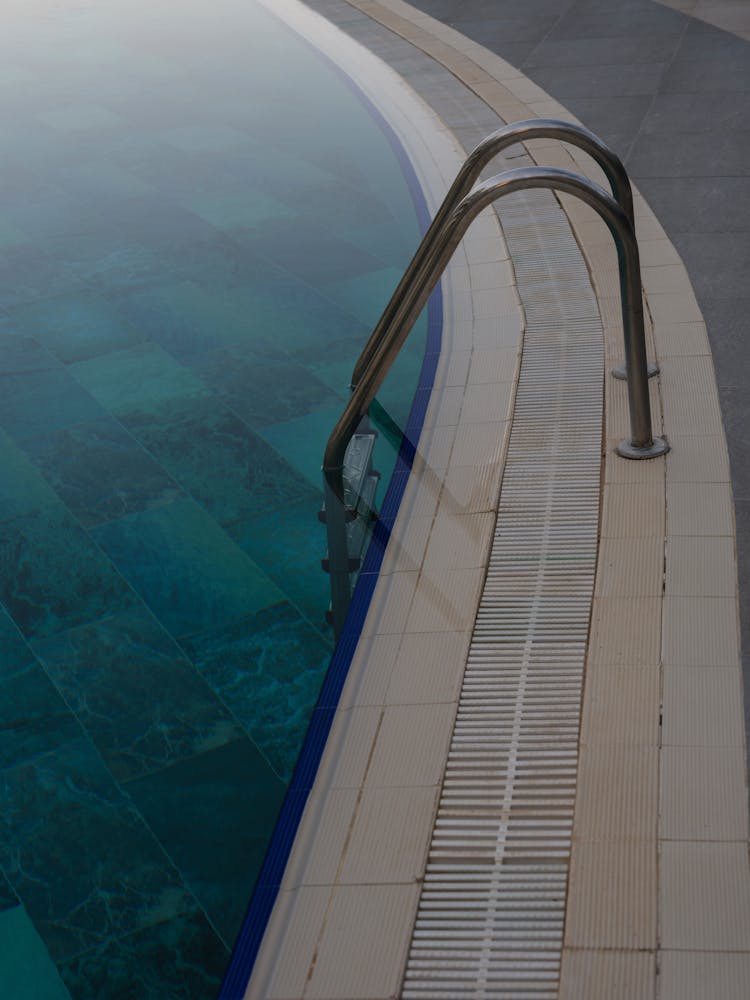 Swimming Pool With Metal Ladder