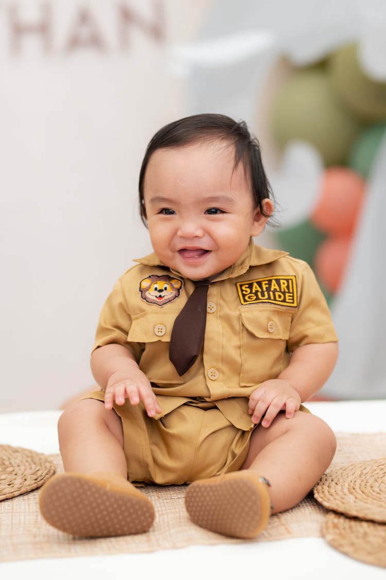 A Cute Child In A Safari Guide Costume