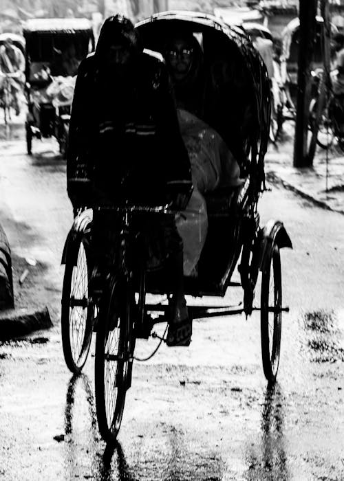 Street people's lifestyles during the rainy seasons.  City people waiting for the rain as the weather is so warm. This photo was taken on 2022-07-20, from Dhaka, Bangladesh, South Asia