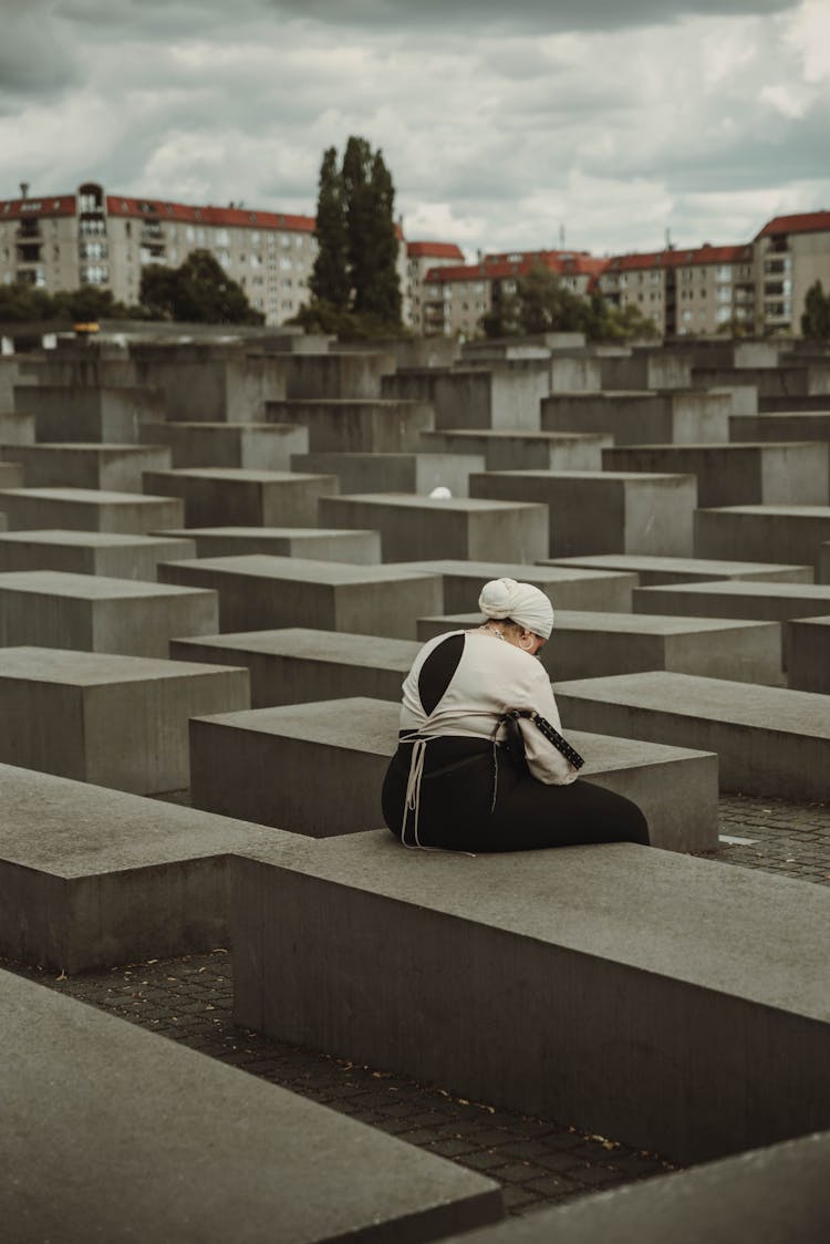 A Woman At The Holocaust Memorial In Europe