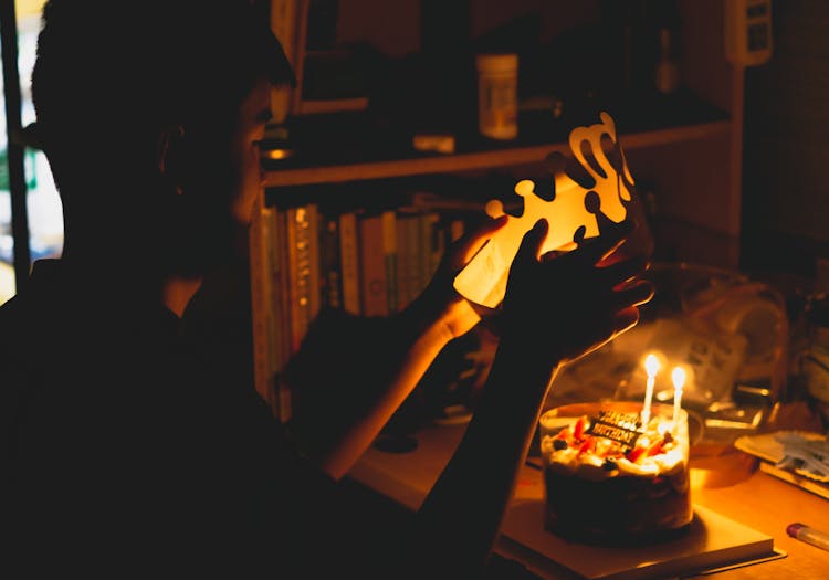 A Boy With A Birthday Cake