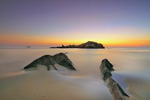 無料 日没時の島の写真 写真素材