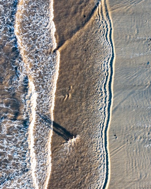 Foto profissional grátis de aerofotografia, andando, areia
