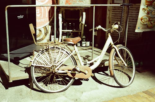 Parked Bicycle on the Streetside