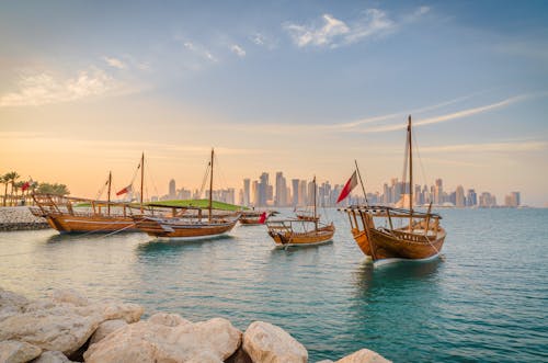 Sail Boats on Body of Water Under Blue Sky