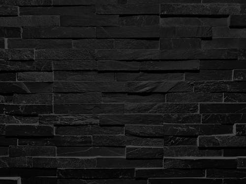 Black Stone Tile Wall in Close-up Photograpgy