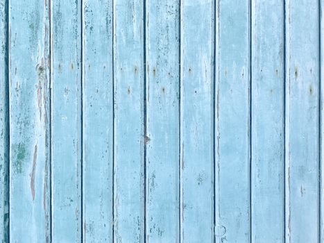 Rustic blue wooden planks with a weathered texture useful for design backgrounds and patterns.