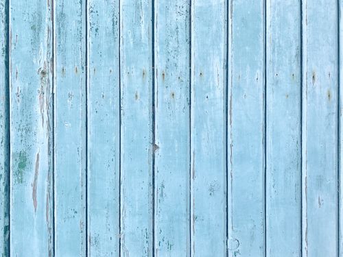Free Rustic blue wooden planks with a weathered texture useful for design backgrounds and patterns. Stock Photo