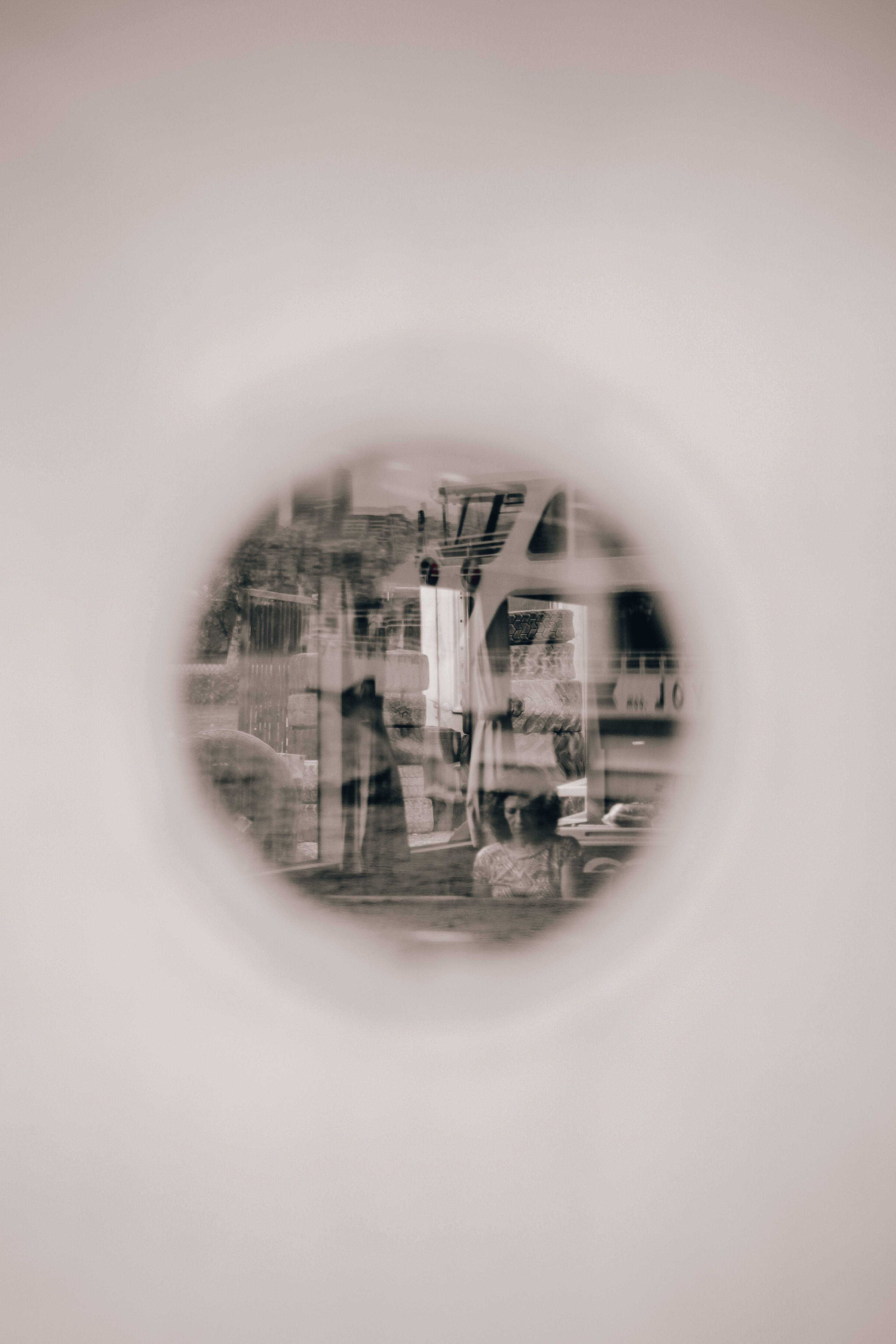 Blurred view through a peephole capturing a street scene in Istanbul, Turkey.