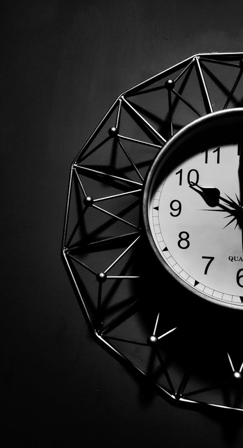 Grayscale Photo of a Wall Clock