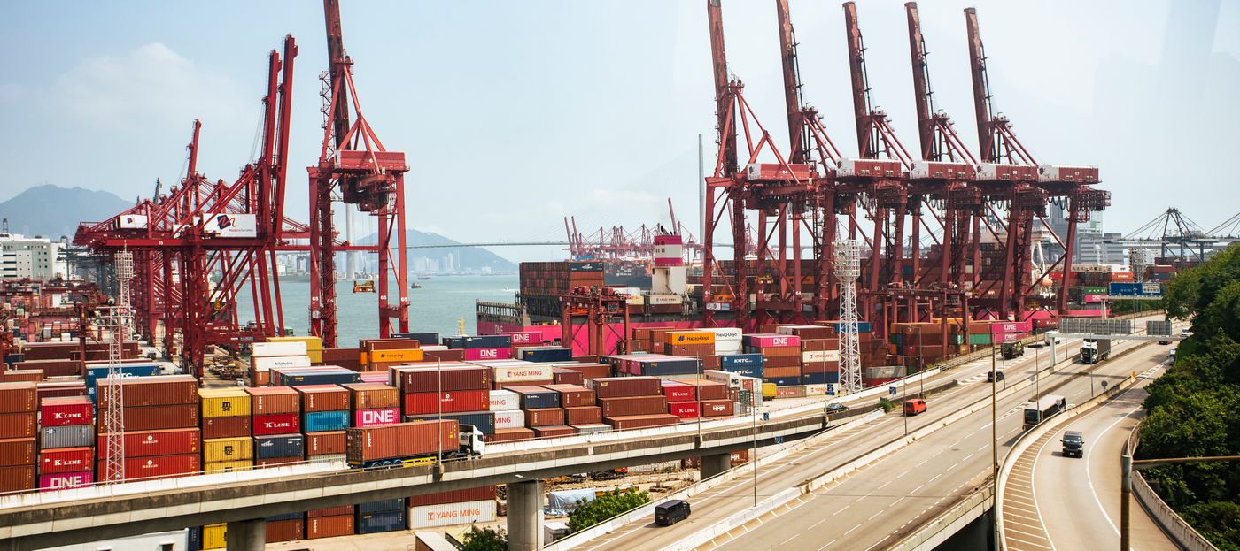 Cargo containers and cranes at a commercial port