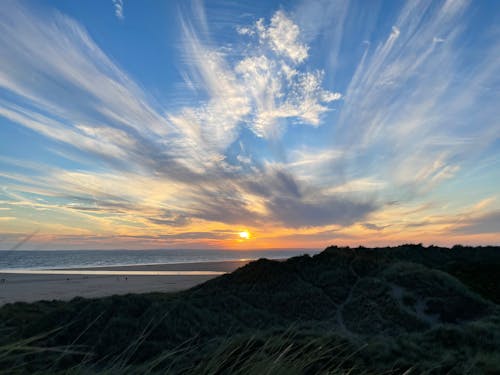 Cloudy Sky over Sea at Sunrise