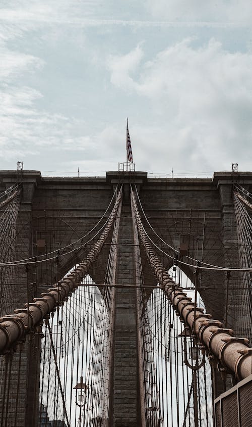 Close-up of Brooklyn Bridge against Blue Sky