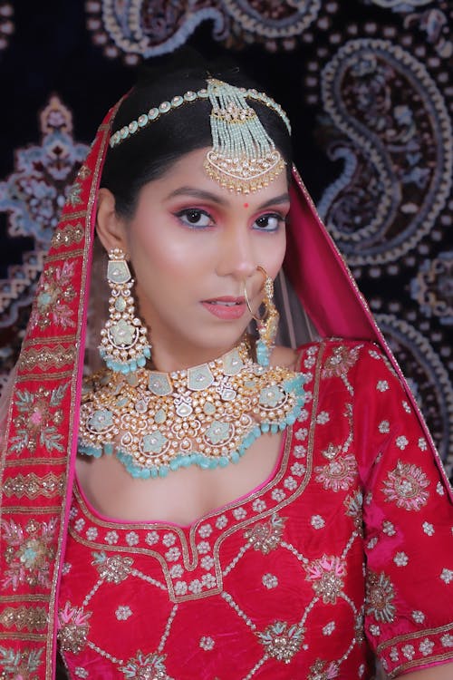 Woman in Traditional Clothing and with Jewelry