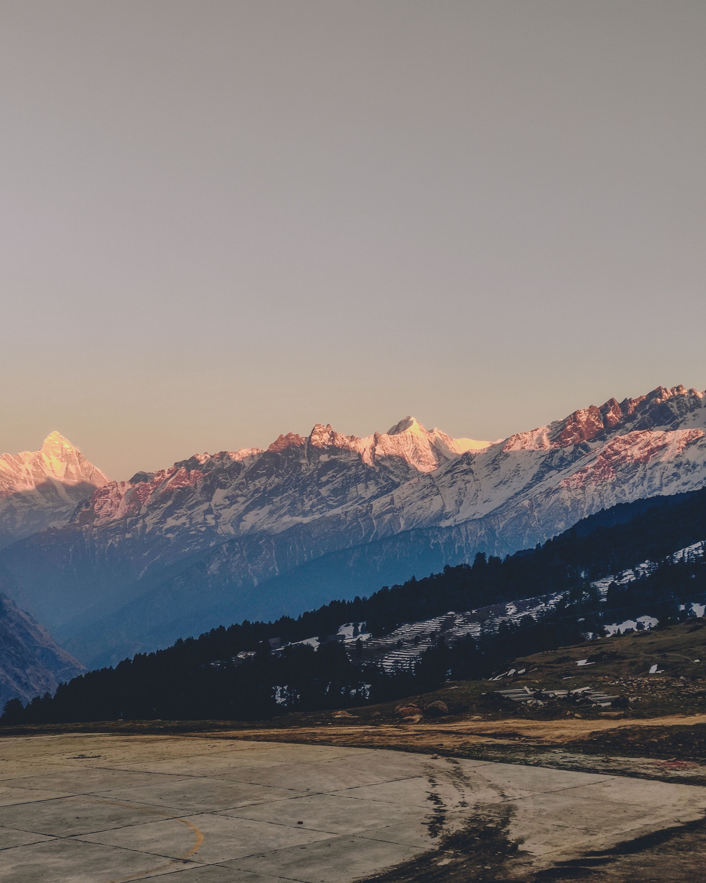 Snow-covered Himalayan mountains in Auli, Uttarakhand at sunset