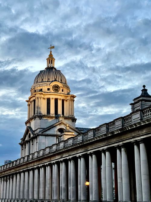 Free Stunning architecture of London's Old Royal Naval College against a cloudy sky. Stock Photo